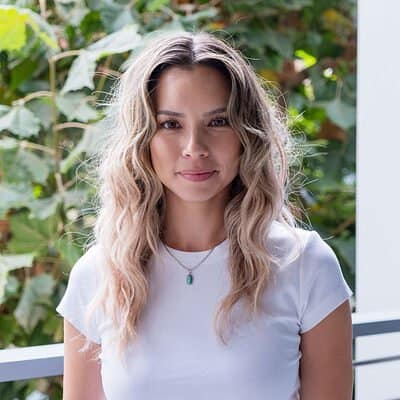 Lindsay Rios, co-host of the Your Future Biz podcast, standing outdoors