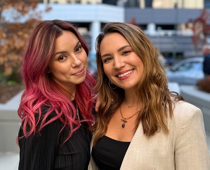 Mandy McEwen and Lindsay Rios smiling together, hosts of the Your Future Biz podcast